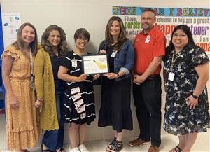 Ms. Padilla receiving the Spotlight award at BVES.